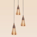 Triple pendant light with cone-shaped carved wooden accents and frosted glass – Checkmark Model 22-3 – Traditional rustic ceiling fixture for wide dining or entrance spaces