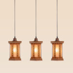 Horizontal pendant light with 3 lantern-style wooden shades and frosted floral glass – Checkmark Model 24h3 – ideal for kitchen counters and dining tables