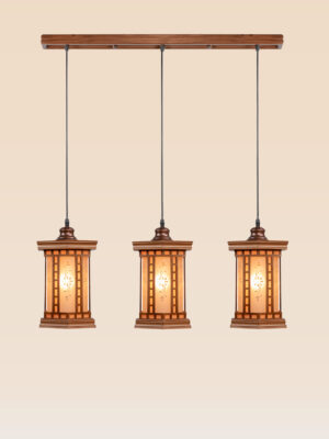 Horizontal pendant light with 3 lantern-style wooden shades and frosted floral glass – Checkmark Model 24h3 – ideal for kitchen counters and dining tables