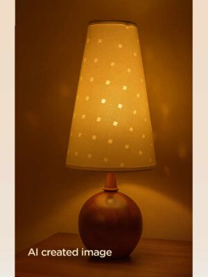 Elegant wooden table lamp with round base and tall fabric shade, casting a soft amber glow—ideal for cozy, ambient bedroom or living room lighting