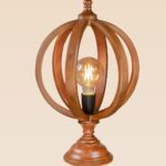 Artistic wooden table lamp with wide circle-pattern shade – Checkmark