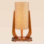 Modern wooden table lamp with tall cylindrical woven shade on curved wood base – Checkmark