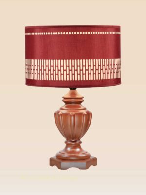 Handcrafted wooden table lamp with carved brown base and deep red patterned fabric shade – DARKAR design from Checkmark Trading Dubai