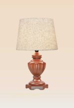 Classic handcrafted wooden table lamp with carved vase-style base and beige fabric shade – DARKAR design, available at Checkmark Trading Dubai