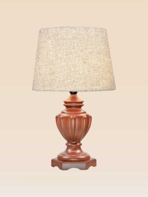 Classic handcrafted wooden table lamp with carved vase-style base and beige fabric shade – DARKAR design, available at Checkmark Trading Dubai