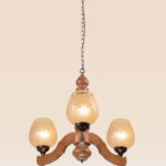 Traditional wooden chandelier with three engraved frosted glass shades, suspended by a rustic chain, ideal for classic dining rooms or cozy interiors-front-view