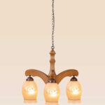 Three-light wooden chandelier with curved arms and etched floral frosted glass shades, hanging by a bronze chain from a wooden canopy – Model 208-3 -side-view