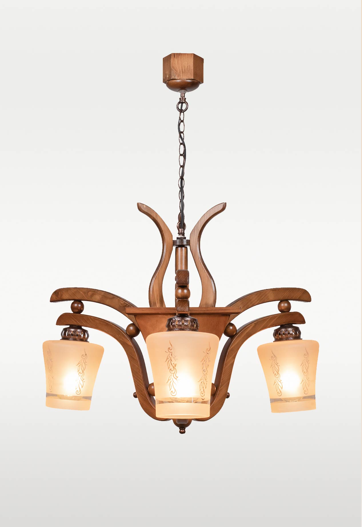 wooden-chandelier-warm-light-dubai-checkmark-210-3- Wooden chandelier 210-3 with three frosted floral glass shades and rustic curved arms, crafted by DARKAR Lighting Industries.