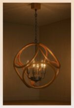 Checkmark 215 chandelier with sculpted wood orbit rings and 5 matte black candle holders — modern artistic design-light-on