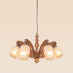 Elegant wooden chandelier 234-6 with six carved arms and frosted floral bell shades, traditional rustic chandelier by DARKAR Lighting Industries.