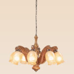 8-light wooden chandelier with engraved arms and floral frosted glass – Checkmark 234-8-side-view