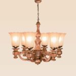 Wooden chandelier model 241a6 with six curved arms and frosted floral glass shades, suspended by chain from a carved ceiling cup – traditional design by Checkmark-side-view
