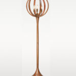 Wooden floor lamp model 607G with golden-finished candle-style holders, globe-shaped head, and trumpet base