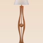 Wooden floor lamp model 609 with curved sculptural design, central sphere detail, and fabric lampshade – artistic decorative lighting for modern interiors