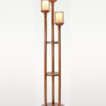 Wooden floor lamp model 612A with three frosted-glass shades and a central wooden shelf – tall decorative lighting piece for warm modern interiors