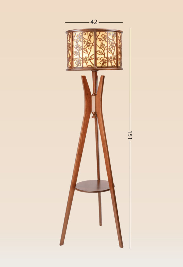Wooden tripod floor lamp model 635 with glowing floral-pattern drum shade and mid-level round shelf – artistic decorative lighting for living or bedroom use -with-size