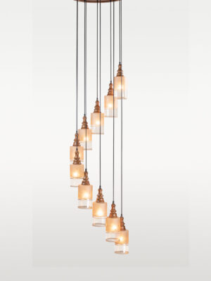 Ten-light spiral pendant lamp with cylindrical frosted glass and carved wooden tops – Checkmark Model 38-11 – ideal for tall spaces, stairs, and modern rustic lobbies