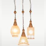 Triple wooden pendant light with mixed frosted etched glass shades – Checkmark Model 38-3 – ideal for kitchen islands, stairwells, and modern rustic interiors