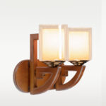Double wooden wall sconce light with twin amber glass shades – distributed by Checkmark, crafted by DARKAR Lighting Industries.