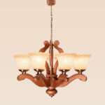 Handcrafted wooden chandelier model 244a8 with eight sculpted arms, flared frosted glass shades, and bronze fittings — a traditional wooden ceiling light by Checkmark