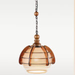 Amber glass globe pendant light with carved wood cage – Checkmark Model 49 – warm rustic lighting for dining rooms and cozy interiors