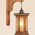 Rectangular wooden wall sconce light with frosted floral glass shade – distributed by Checkmark, crafted by DARKAR Lighting Industries