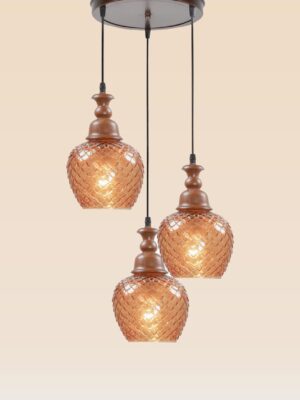 Triple pendant light with wooden crowns and amber-patterned glass globes – Checkmark Model 61-3 – rustic cascading lighting with pinecone-style glow