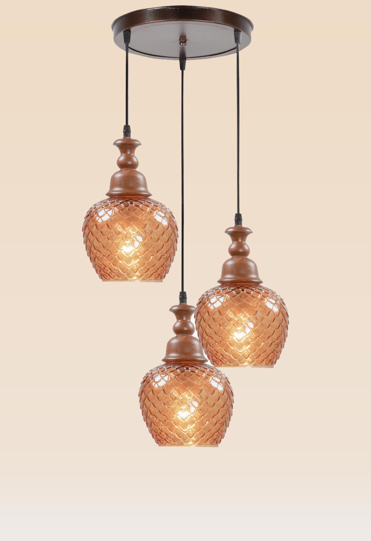 triple-amber-pendant-light-checkmark-61-3 Triple pendant light with wooden crowns and amber-patterned glass globes – Checkmark Model 61-3 – rustic cascading lighting with pinecone-style glow