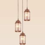Triple wooden pendant light set with etched cylindrical glass – Checkmark Model 53-3 – rustic heritage hanging lights in staggered design