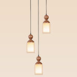 Triple wooden pendant light set with turned tops and frosted square glass shades – Checkmark Model 57-3 – modern rustic cascading ceiling light