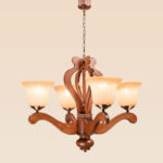 Wooden chandelier model 244a4 with sculpted arms, flared frosted glass shades, and bronze fittings — classic and elegant ceiling light by Checkmark