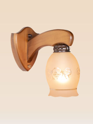 Single-arm wooden wall sconce light with curved bracket and frosted etched glass shade – distributed by Checkmark, crafted by DARKAR Lighting Industries.