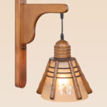 Rustic wooden wall sconce light with flared frosted glass shade and layered wood frame – distributed by Checkmark, crafted by DARKAR Lighting Industries.