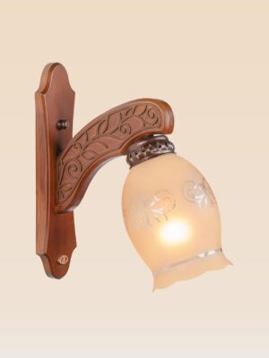 Wooden wall sconce light with floral-etched frosted glass shade – distributed by Checkmark, crafted by DARKAR Lighting Industries.