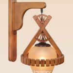 Rustic wooden wall sconce light with decorative geometric frame and frosted glass globe – distributed by Checkmark, crafted by DARKAR Lighting Industries.