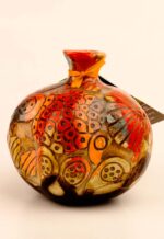 Carved relief ceramic pomegranate art object for elegant interior decoration craved