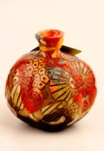 Carved relief ceramic pomegranate art object for elegant interior decoration