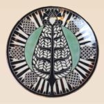 decorative ceramic dish leaf pattern with central vertical motif