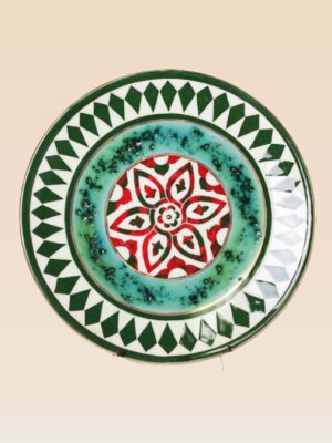 decorative ceramic dish star pattern with green and red radial design