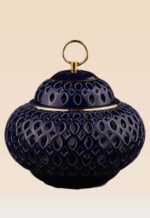 Openwork ceramic lidded jar with glossy glaze and sculptural form