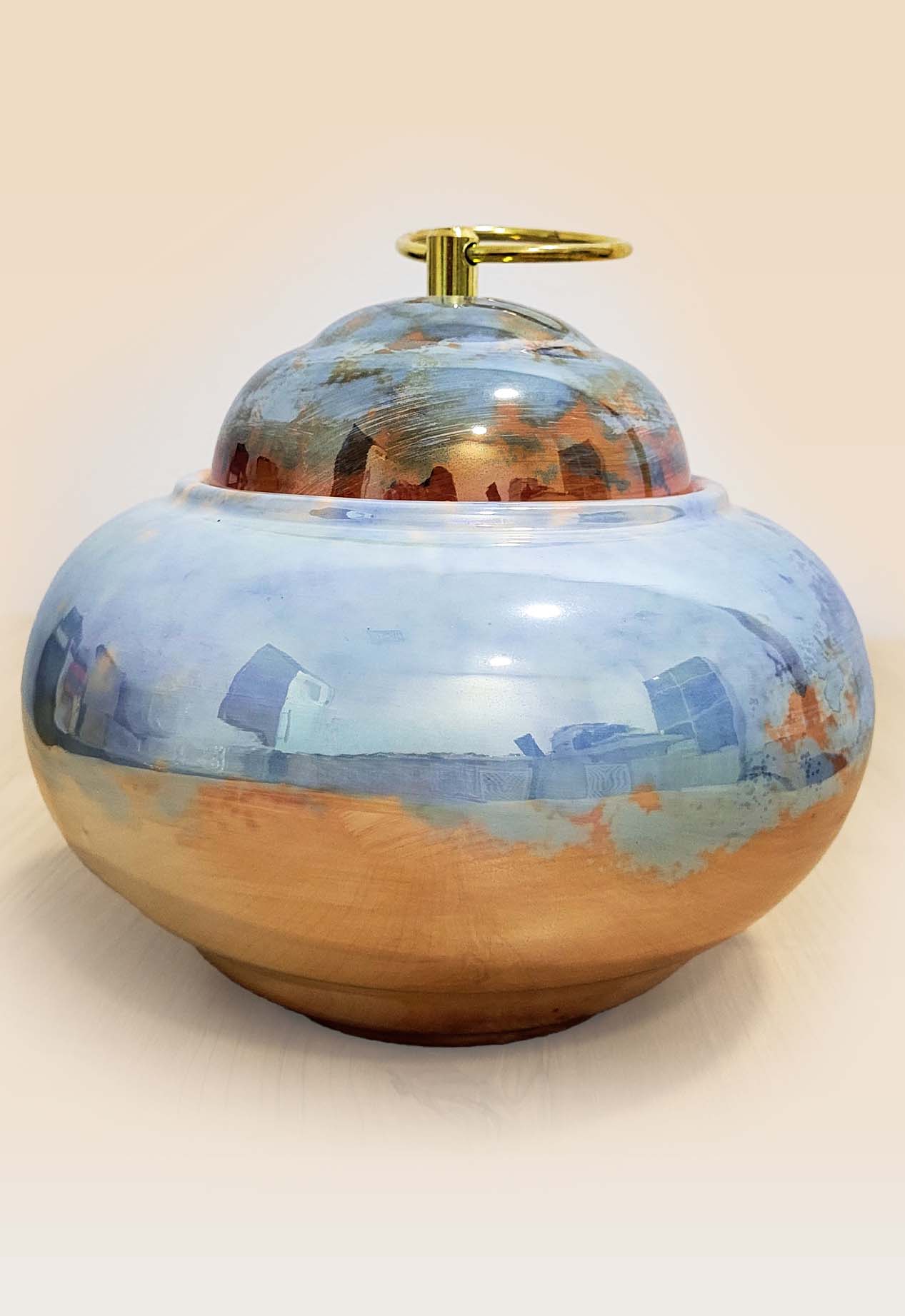 refined-glaze-ceramic-lidded-jar-side-view Refined glaze ceramic lidded jar with smooth surface and sculptural form