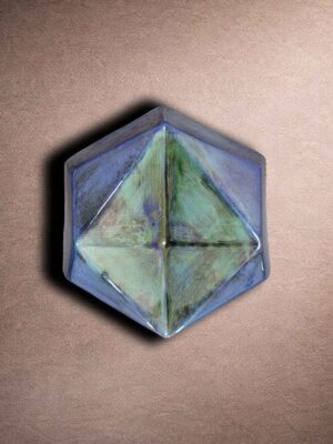 Prism hex tile with glossy glaze and faceted geometric surface