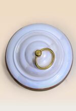 Refined glaze ceramic lidded jar with smooth surface and sculptural form top view small