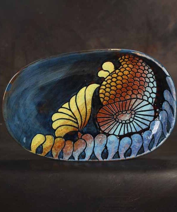 Ceramic art for living rooms styled with warm lighting and refined materials