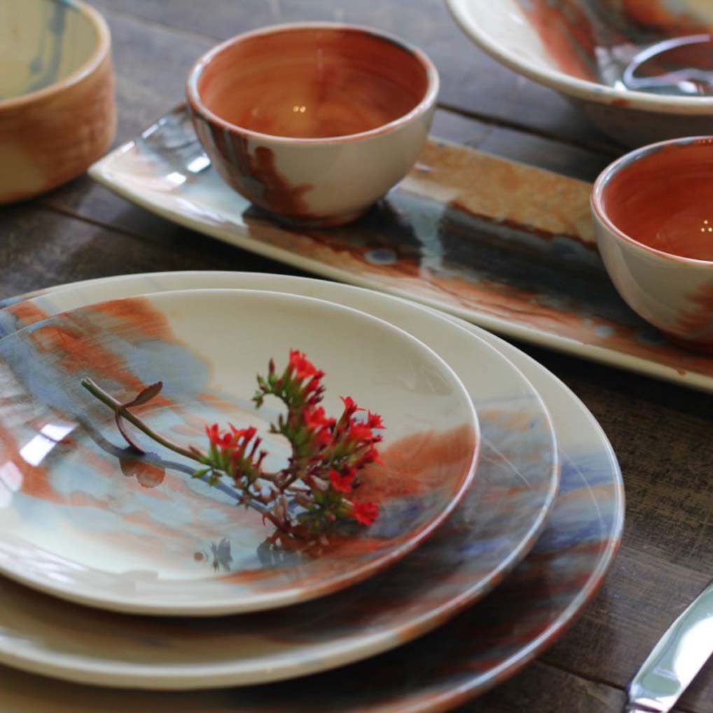 Decorative ceramic plates vs dishes styled as ceramic dining table