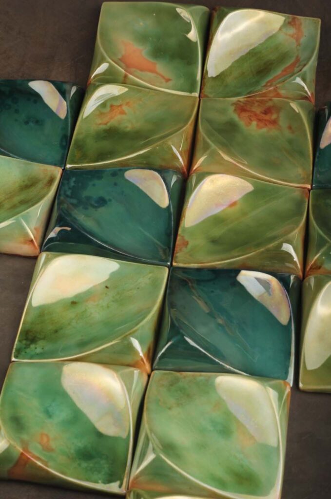 Ceramic wall tiles styled as statement wall décor in an elegant dining room