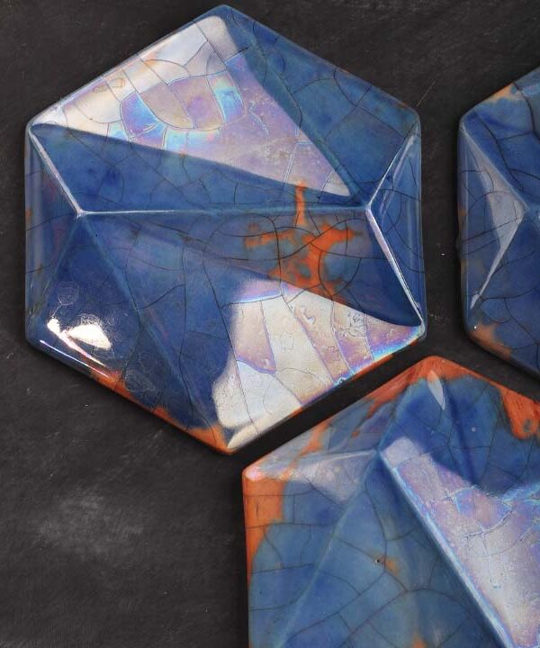 Ceramic wall tiles used as handcrafted ceramic wall art in an elegant interior