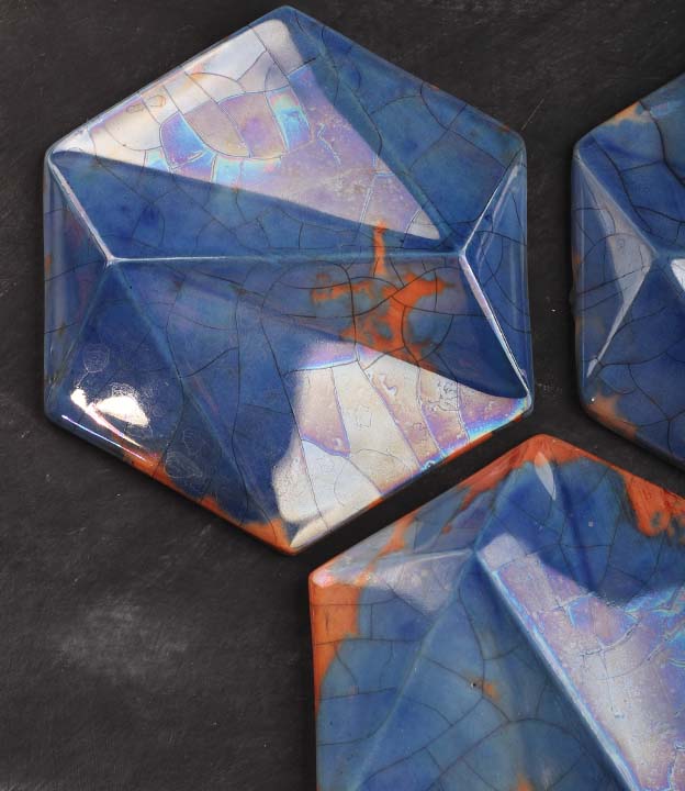 Ceramic wall tiles used as handcrafted ceramic wall art in an elegant interior
