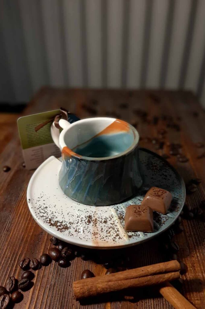 Curated ceramic art for living rooms in a refined interior dining table