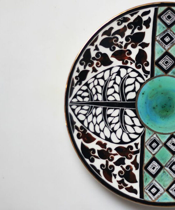Decorative ceramic dish styled as handcrafted ceramic décor in an elegant interior